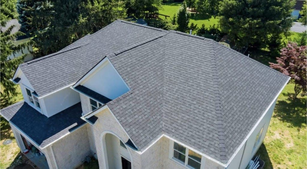 Aerial drone view of a freshly installed Lee Roofing shingle roof